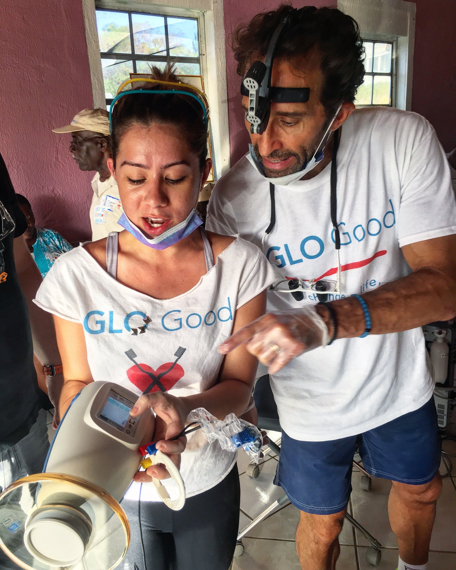 Showing a young patient his new smile